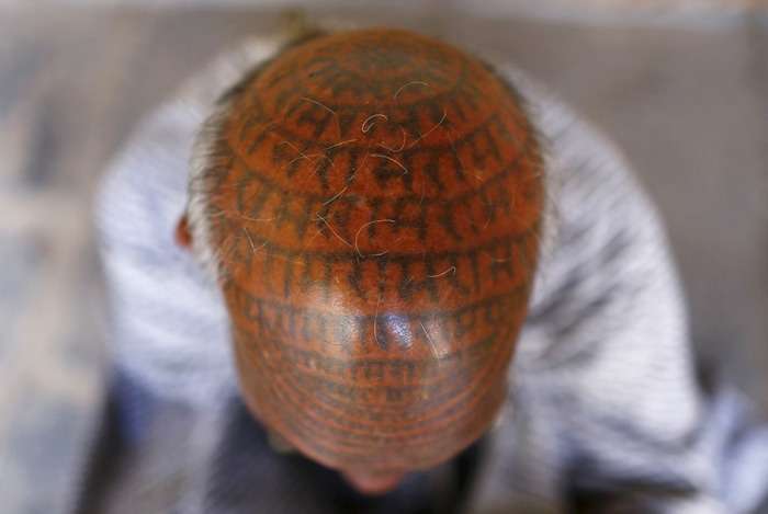 Члени індійської секти «Рамнами самадж» - люди, які покривають себе татуюваннями з імям бога Рами (21 фото)