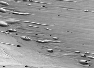 Марсианская весна: новые снимки запечатлели таяние льдов в Chasma Boreale